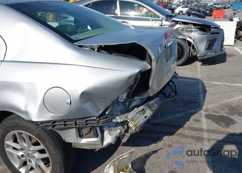 2012 Ford Fusion S z USA, uszkodzony, nr VIN 3FAHP0GAXCR313127